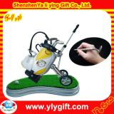 Yellow and white golf bag with pens and green lawn and clock